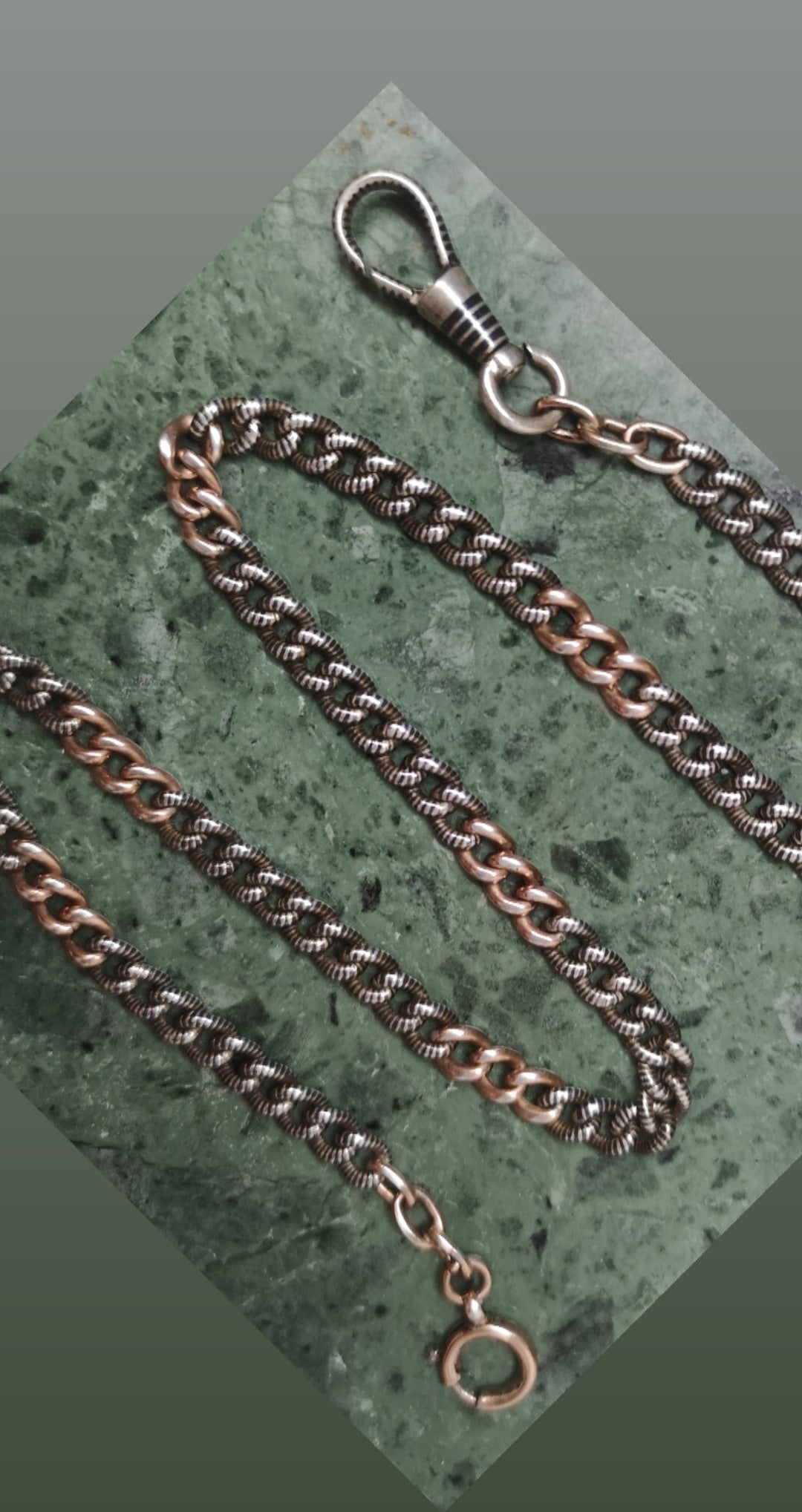 The niello watch chain with rose gold details